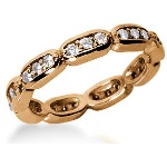 Eternity-ring i rødt gull med runde, brilliantslipte diamanter (ca 0.54ct)
