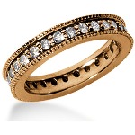 Eternity-ring i rødt gull med runde, brilliantslipte diamanter (ca 0.84ct)