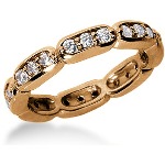 Eternity-ring i rødt gull med runde, brilliantslipte diamanter (ca 0.72ct)