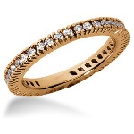 Eternity-ring i rødt gull med runde, brilliantslipte diamanter (ca 0.57ct)