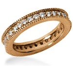 Eternity-ring i rødt gull med runde, brilliantslipte diamanter (ca 0.64ct)